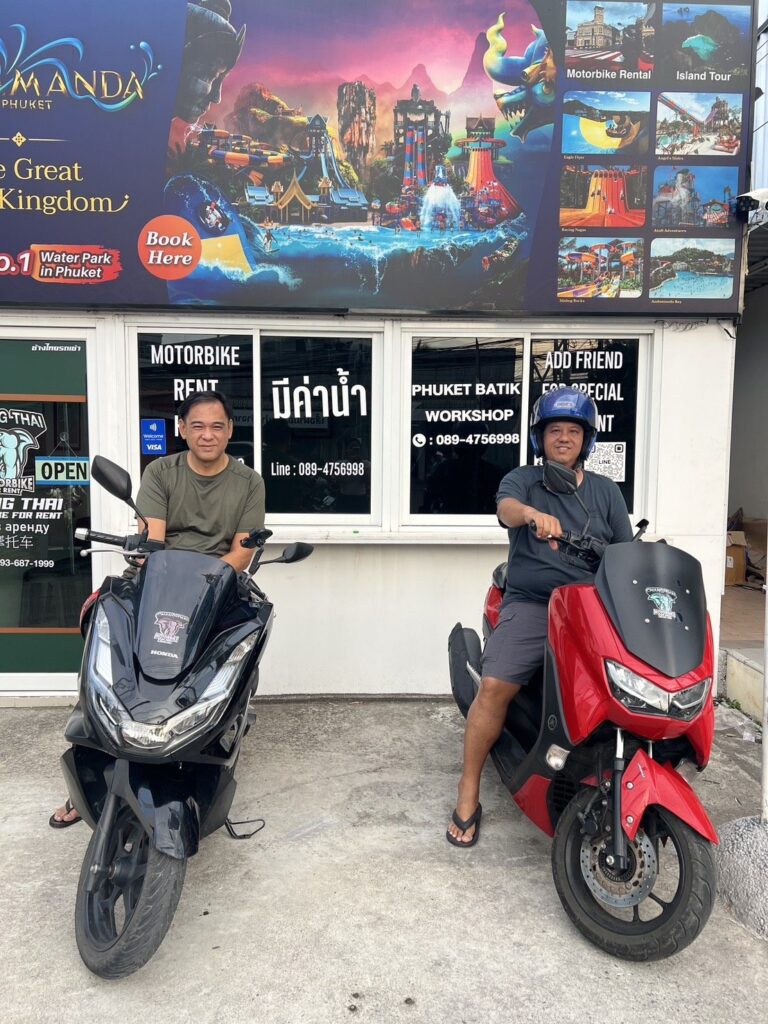 Motorbike Rental in Chalong 4 Two customers on a black Honda PCX and a red Yamaha NMAX in front of the Chalong branch