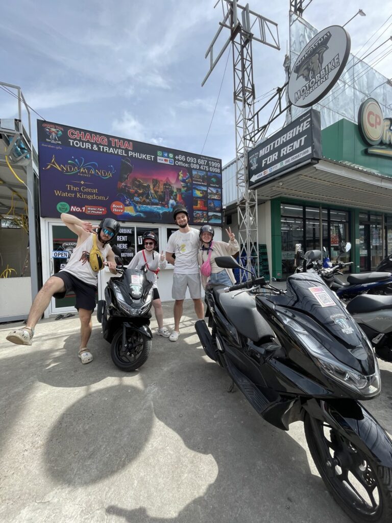 Motorbike Rental in Chalong 8 Customers posing with Honda PCX scooters outside the Chalong branch