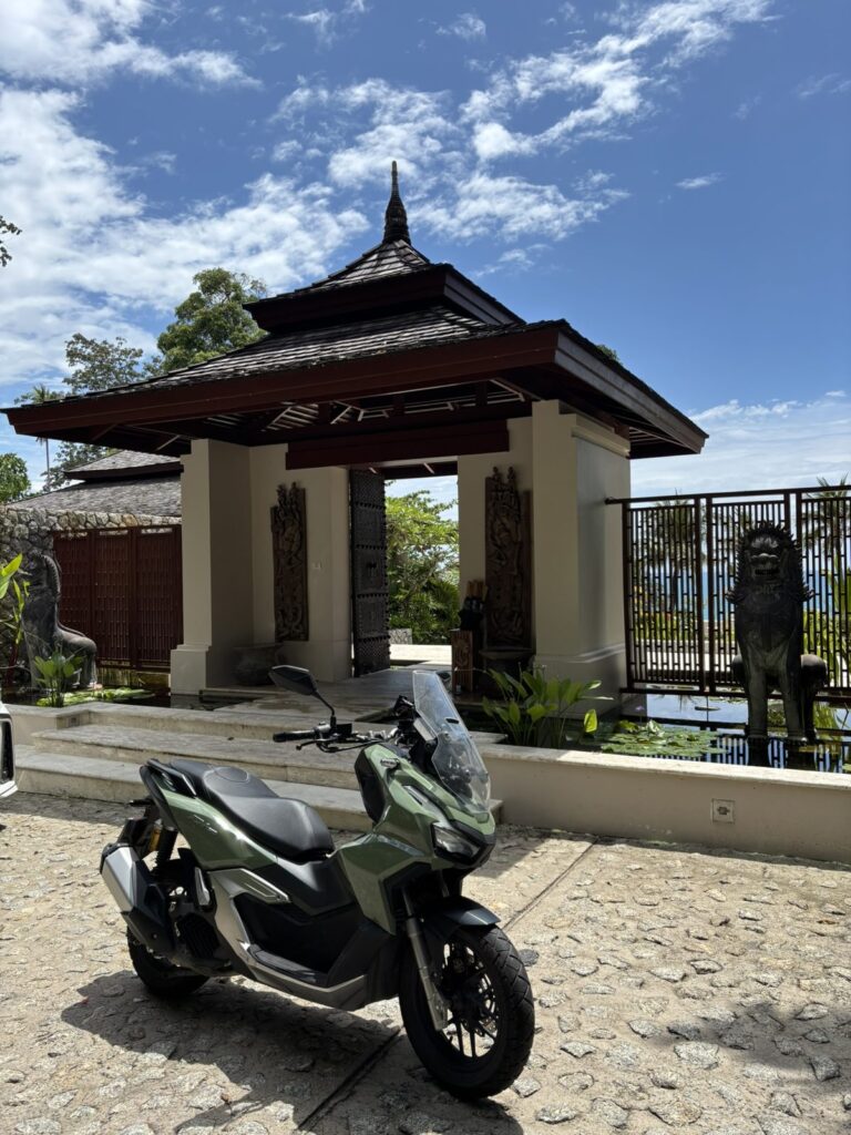 Motorbike Rental at Kamala Beach 2 Green Honda ADV 160 scooter delivered to a resort entrance in Kamala, Phuket