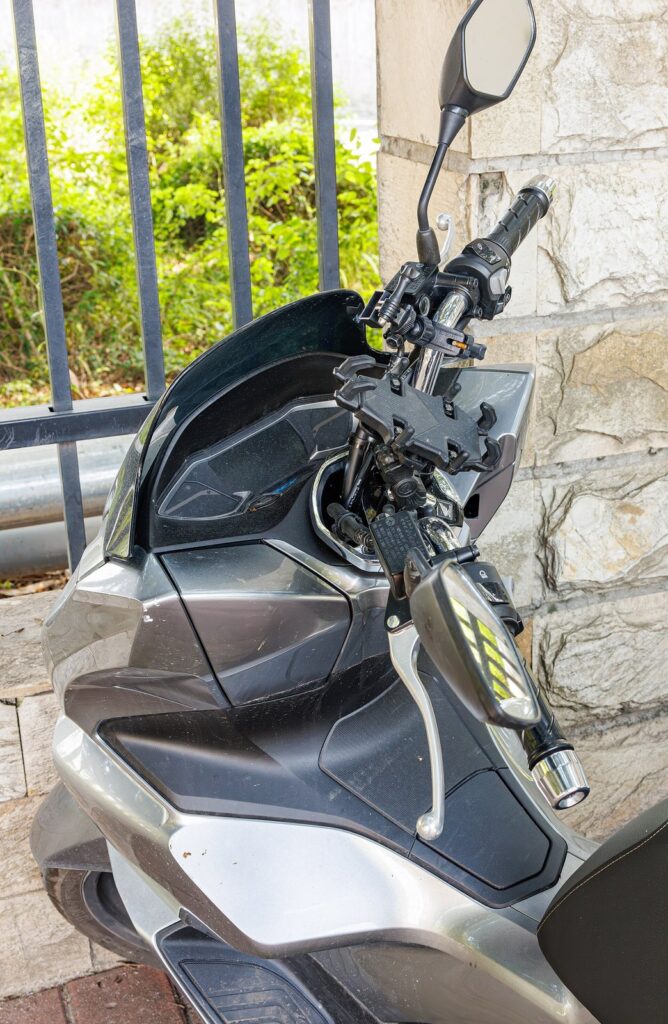 Motorbike Rental Damage Waiver: Why It’s Essential for Every Rider 6 Front fairing, windscreen and mirror of a Honda PCX 160 scooter