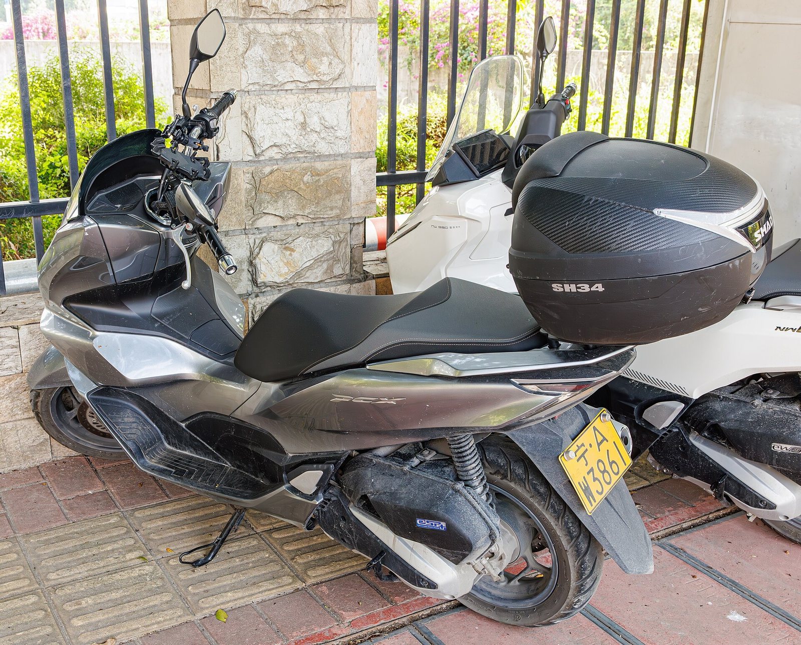 Two-Up Touring on the Honda PCX 160: Real Routes for Couples in Phuket 1 Grey Honda PCX 160 scooter fitted with a rear top box