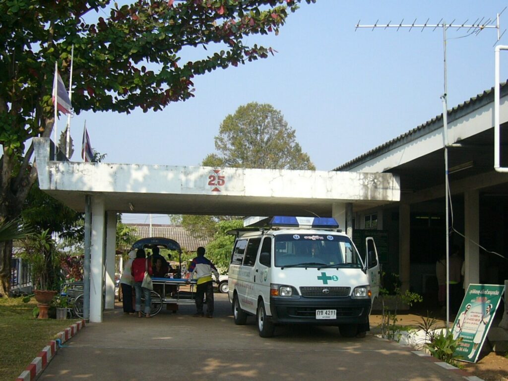 How to Claim P.A. (พ.ร.บ.) Insurance After a Motorbike Accident in Phuket 7 Emergency entrance of a public hospital in Thailand with an ambulance parked under the canopy