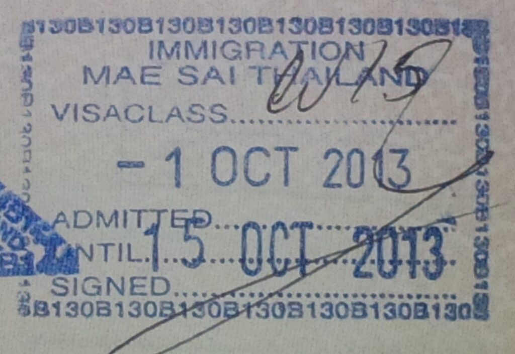 Long-Term Scooter Rental Phuket — Monthly & Expat Guide 2026 3 Thai immigration entry stamp in a passport, dated October 2013