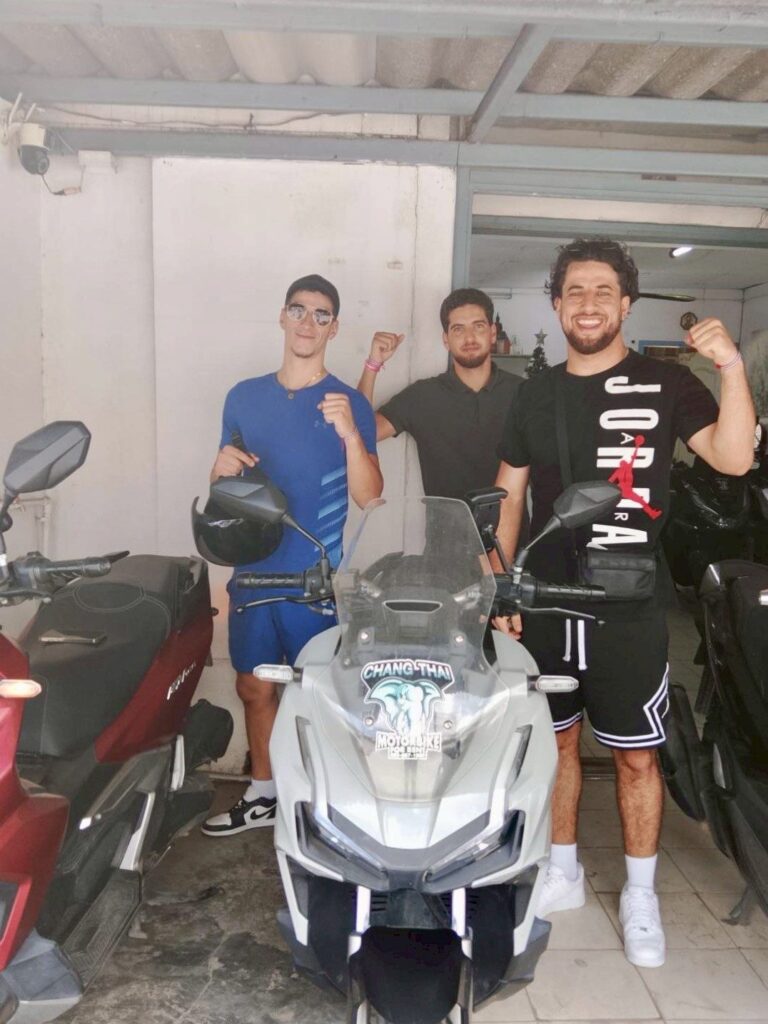 Motorbike Rental at Laguna Phuket 2 Three customers with a grey Honda ADV scooter after picking it up in Laguna